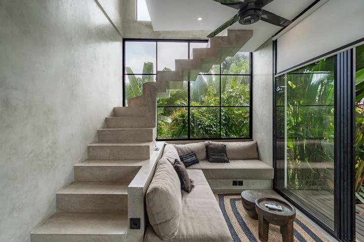 Elegante sala de estar con mobiliario moderno en un apartamento en Building Gang Taman Sri - balisuperhost - 1522469 en Mengwi, Badung Regency Elegante sala de estar con mobiliario moderno en un apartamento en Building Gang Taman Sri - balisuperhost - 1522469 en Mengwi, Badung Regency