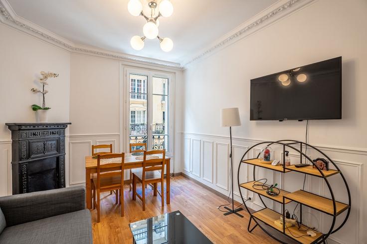 Elegante sala de estar con mobiliario moderno en un apartamento en Building Rue Auguste Chabrières - bauvaut-88 - 1631906 en 15th arrondissement, Paris