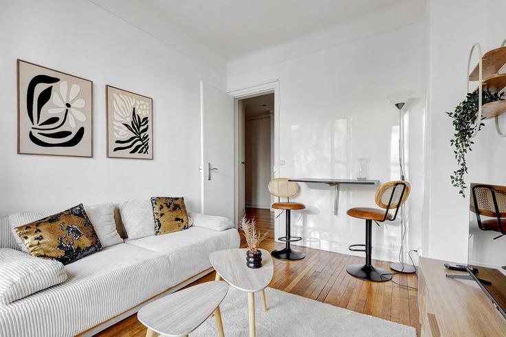 Salle de séjour élégante avec mobilier moderne dans un appartement à Building Boulevard Lefebvre - bauvaut-88 - 1585470 à 15th arrondissement, Paris Salle de séjour élégante avec mobilier moderne dans un appartement à Building Boulevard Lefebvre - bauvaut-88 - 1585470 à 15th arrondissement, Paris