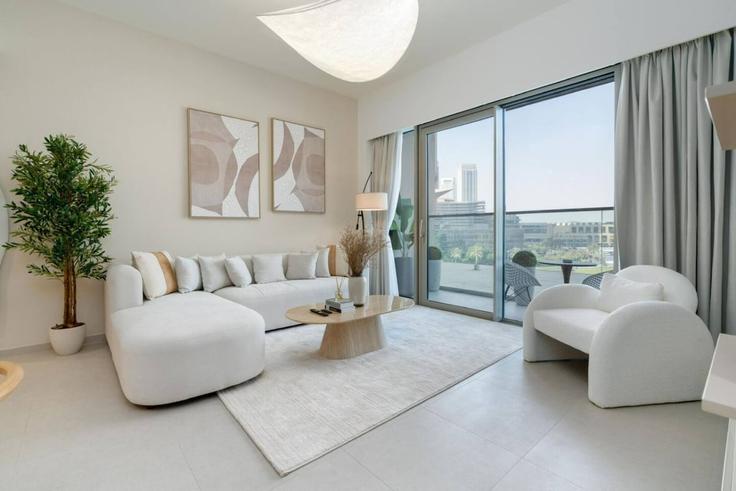 Sala de estar elegantemente projetada com móveis modernos em um apartamento no Building grande signature residences - bellagge-vacation-homes-llc - 1627115 em Burj Khalifa, Dubai Sala de estar elegantemente projetada com móveis modernos em um apartamento no Building grande signature residences - bellagge-vacation-homes-llc - 1627115 em Burj Khalifa, Dubai