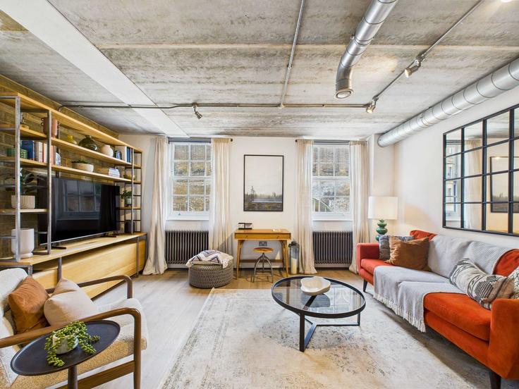 Sala de estar elegantemente projetada com móveis modernos em um apartamento no Building Great Suffolk Street - belondon - 1407005 em London Borough of Southwark, London Sala de estar elegantemente projetada com móveis modernos em um apartamento no Building Great Suffolk Street - belondon - 1407005 em London Borough of Southwark, London