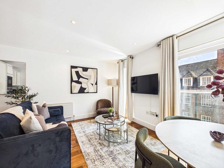 Sala de estar elegantemente projetada com móveis modernos em um apartamento no Building Medway Street - belondon - 1595226 em City of Westminster, London Sala de estar elegantemente projetada com móveis modernos em um apartamento no Building Medway Street - belondon - 1595226 em City of Westminster, London