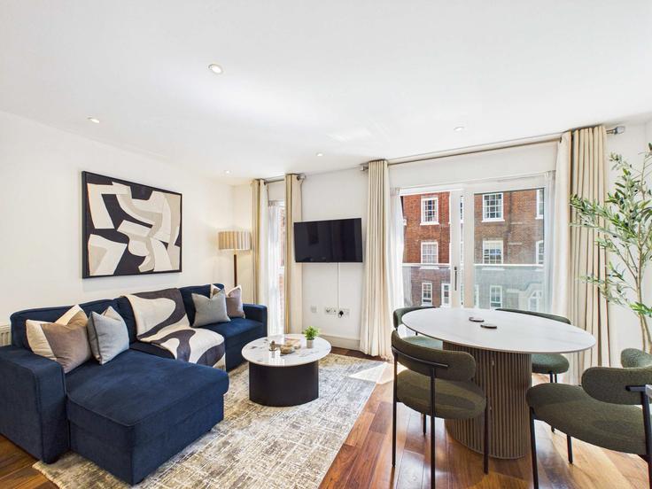Sala de estar elegantemente projetada com móveis modernos em um apartamento no Building Medway Street - belondon - 1595221 em City of Westminster, London Sala de estar elegantemente projetada com móveis modernos em um apartamento no Building Medway Street - belondon - 1595221 em City of Westminster, London