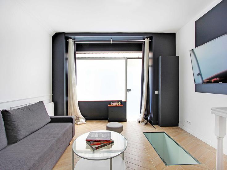 Paris 11th arrondissementのBuilding Rue Pétion - belvilla-ag-dancenter-as - 1446679のアパートメントにある、モダンな家具を備えたエレガントなデザインのリビングルーム Paris 11th arrondissementのBuilding Rue Pétion - belvilla-ag-dancenter-as - 1446679のアパートメントにある、モダンな家具を備えたエレガントなデザインのリビングルーム