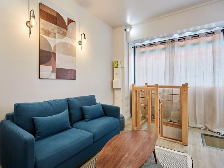 Building Passage du Caire - belvilla-ag-dancenter-as - 1448206 adresindeki bir dairede modern mobilyalarla zarif bir şekilde tasarlanmış oturma odası 2nd arrondissement, Paris