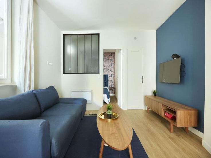 Salle de séjour élégante avec mobilier moderne dans un appartement à Building Avenue Jean Moulin - belvilla-ag-dancenter-as - 1430096 à 14th arrondissement, Paris