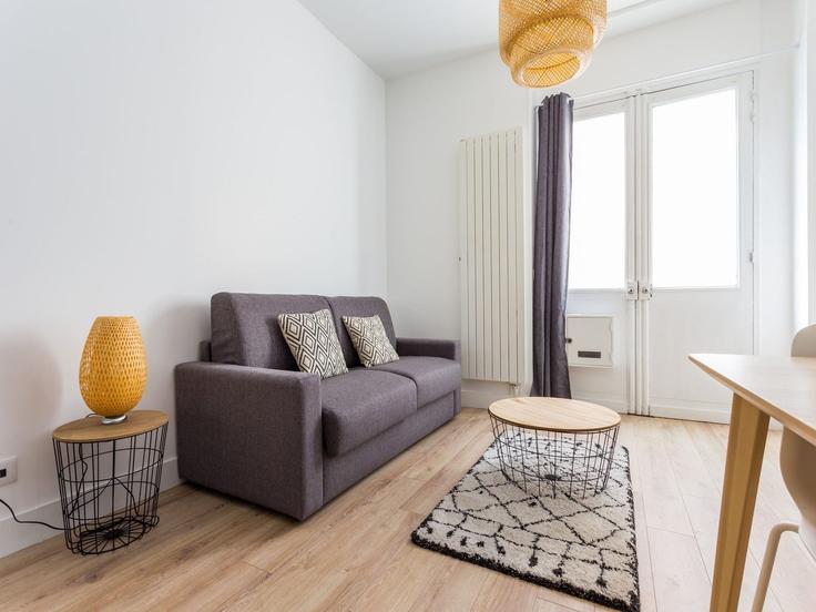 Elegantly designed living room with modern furnishings in an apartment at Building Rue Juge - belvilla-ag-dancenter-as - 1446134 in 15th arrondissement, Paris Elegantly designed living room with modern furnishings in an apartment at Building Rue Juge - belvilla-ag-dancenter-as - 1446134 in 15th arrondissement, Paris