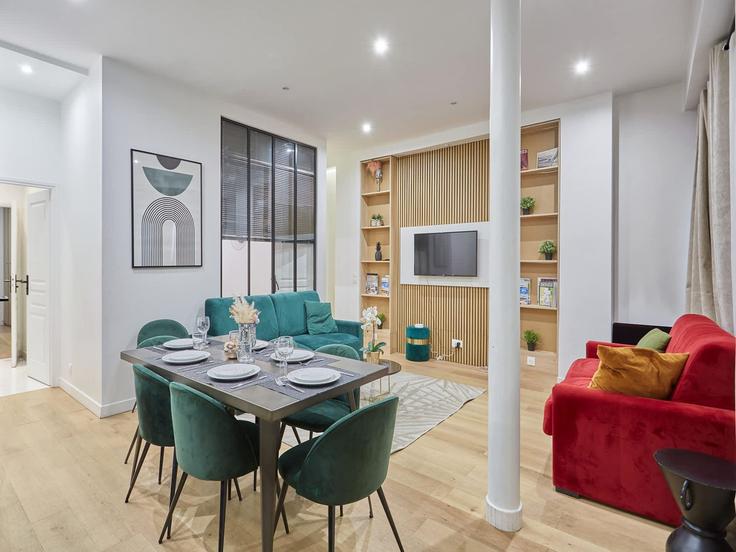 Elegantly designed living room with modern furnishings in an apartment at Building Rue Pierre Fontaine - belvilla-ag-dancenter-as - 1562262 in 9th arrondissement, Paris