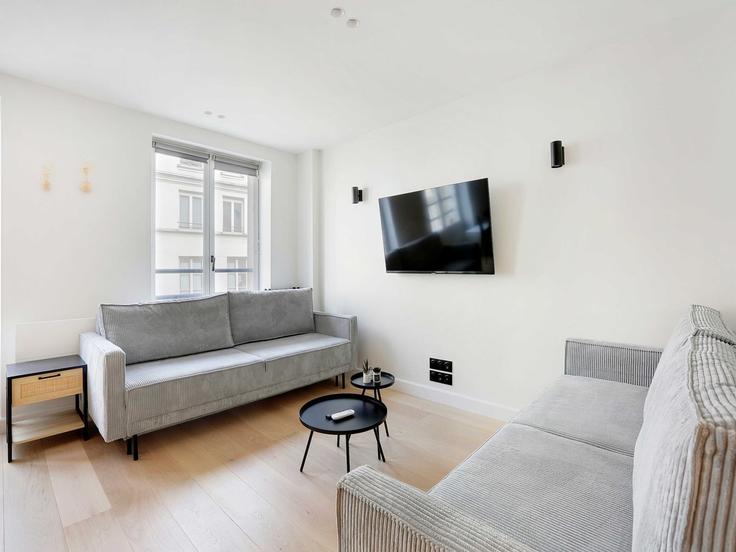 Salle de séjour élégante avec mobilier moderne dans un appartement à Building Rue Blondel - belvilla-ag-dancenter-as - 1446513 à 2nd arrondissement, Paris Salle de séjour élégante avec mobilier moderne dans un appartement à Building Rue Blondel - belvilla-ag-dancenter-as - 1446513 à 2nd arrondissement, Paris