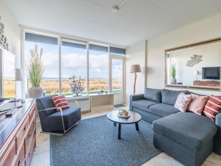 Elegant gestaltetes Wohnzimmer mit moderner Einrichtung in einer Wohnung im Building Badweg - belvilla-ag-dancenter-as - 1411901 in De Koog, De Koog Elegant gestaltetes Wohnzimmer mit moderner Einrichtung in einer Wohnung im Building Badweg - belvilla-ag-dancenter-as - 1411901 in De Koog, De Koog