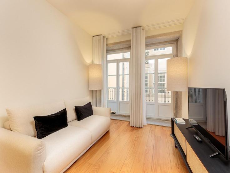 Salle de séjour élégante avec mobilier moderne dans un appartement à Building Rua das Flores - belvilla-ag-dancenter-as - 1420194 à União das freguesias de Cedofeita, Santo Ildefonso, Sé, Miragaia, São Nicolau e Vitória, Porto Salle de séjour élégante avec mobilier moderne dans un appartement à Building Rua das Flores - belvilla-ag-dancenter-as - 1420194 à União das freguesias de Cedofeita, Santo Ildefonso, Sé, Miragaia, São Nicolau e Vitória, Porto