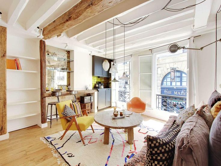 Elegantly designed living room with modern furnishings in an apartment at Building Rue Saint-André des Arts - belvilla-ag-dancenter-as - 1396281 in 6th arrondissement, Paris