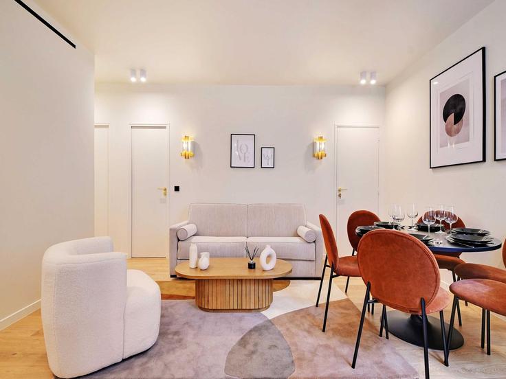 Sala de estar elegantemente projetada com móveis modernos em um apartamento no Building Rue de la Grange Batelière - belvilla-ag-dancenter-as - 1410701 em 9th arrondissement, Paris Sala de estar elegantemente projetada com móveis modernos em um apartamento no Building Rue de la Grange Batelière - belvilla-ag-dancenter-as - 1410701 em 9th arrondissement, Paris