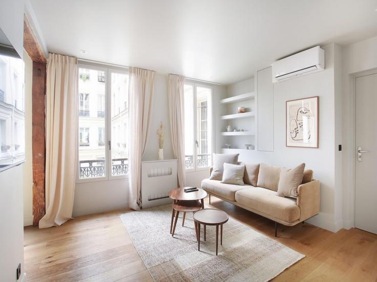 Salle de séjour élégante avec mobilier moderne dans un appartement à Building Rue d'Hauteville - belvilla-ag-dancenter-as - 1408413 à 10th arrondissement, Paris