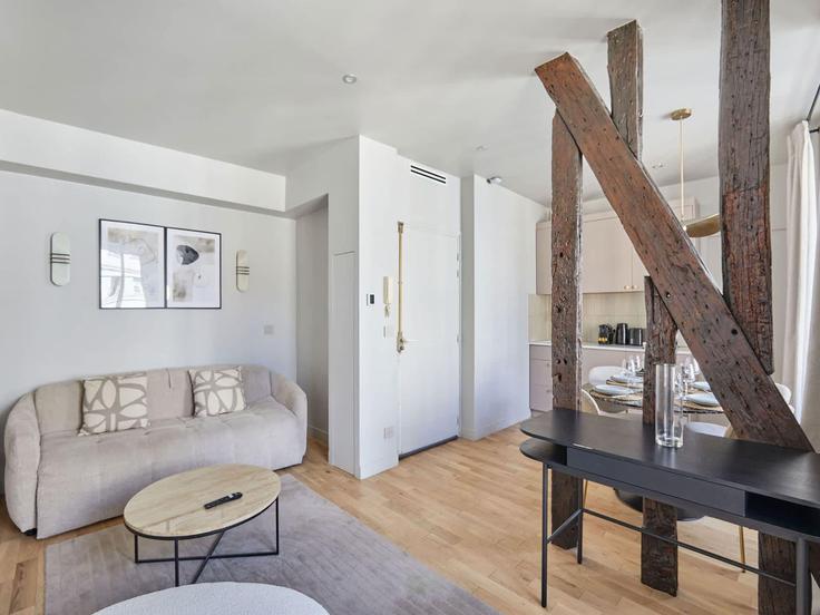 Sala de estar elegantemente projetada com móveis modernos em um apartamento no Building Rue du Faubourg Saint-Antoine - belvilla-ag-dancenter-as - 1396381 em 12th arrondissement, Paris Sala de estar elegantemente projetada com móveis modernos em um apartamento no Building Rue du Faubourg Saint-Antoine - belvilla-ag-dancenter-as - 1396381 em 12th arrondissement, Paris