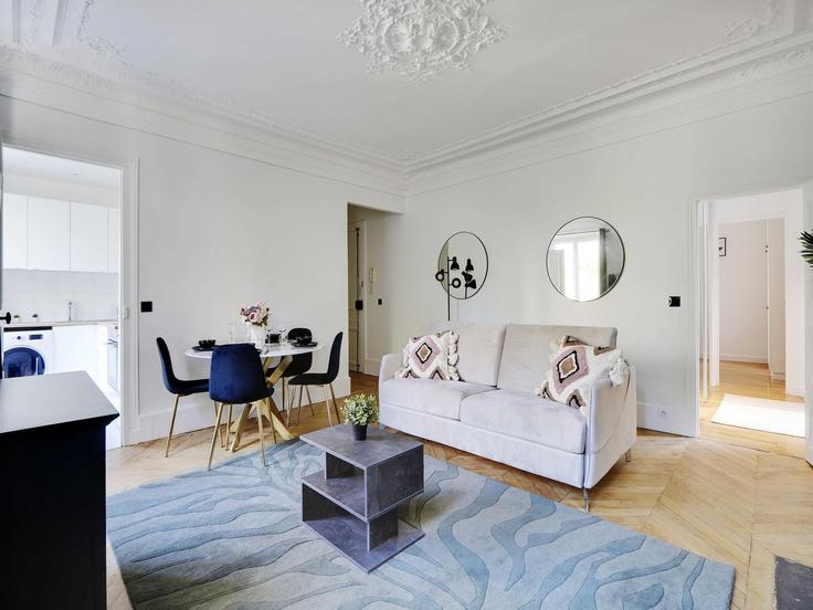 Salle de séjour élégante avec mobilier moderne dans un appartement à Building Rue Nollet - belvilla-ag-dancenter-as - 1410712 à 17th arrondissement, Paris Salle de séjour élégante avec mobilier moderne dans un appartement à Building Rue Nollet - belvilla-ag-dancenter-as - 1410712 à 17th arrondissement, Paris