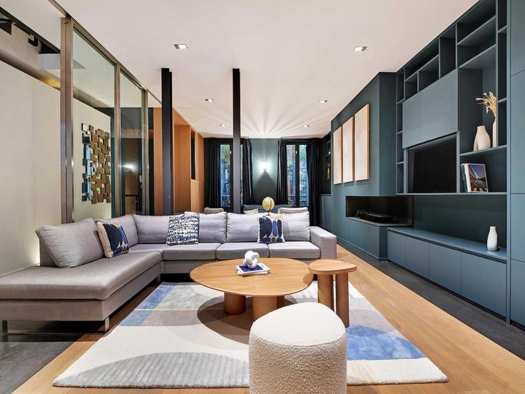 Elegantly designed living room with modern furnishings in an apartment at Building Boulevard Pereire - belvilla-ag-dancenter-as - 1396287 in 17th arrondissement, Paris