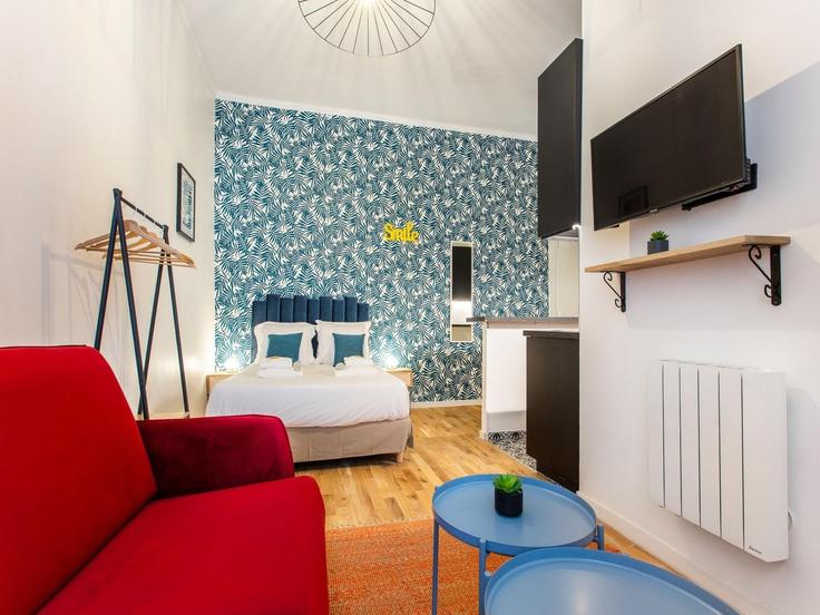 Sala de estar elegantemente projetada com móveis modernos em um apartamento no Building Rue du Faubourg Saint-Antoine - belvilla-ag-dancenter-as - 1392823 em 12th arrondissement, Paris Sala de estar elegantemente projetada com móveis modernos em um apartamento no Building Rue du Faubourg Saint-Antoine - belvilla-ag-dancenter-as - 1392823 em 12th arrondissement, Paris