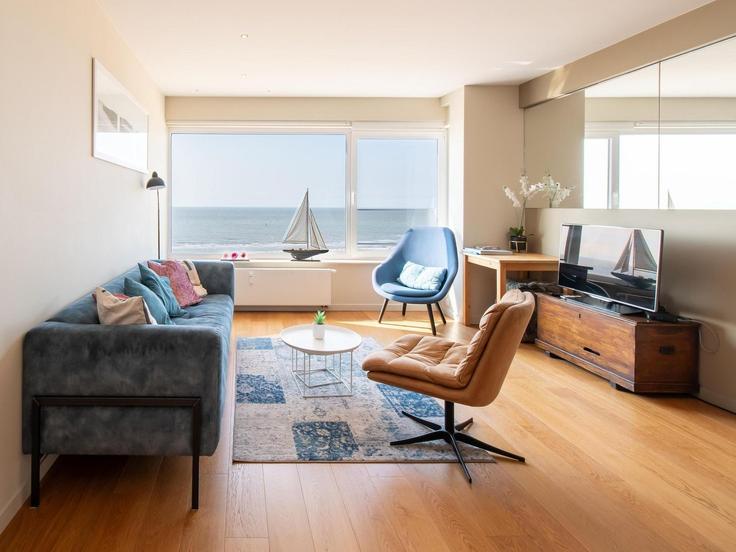 Sala de estar elegantemente projetada com móveis modernos em um apartamento no Building Albert I-promenade - belvilla-ag-dancenter-as - 1424688 em Ostend, Ostend