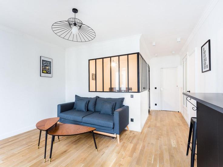 Sala de estar elegantemente projetada com móveis modernos em um apartamento no Building Rue du Faubourg Saint-Antoine - belvilla-ag-dancenter-as - 1399539 em 12th arrondissement, Paris Sala de estar elegantemente projetada com móveis modernos em um apartamento no Building Rue du Faubourg Saint-Antoine - belvilla-ag-dancenter-as - 1399539 em 12th arrondissement, Paris