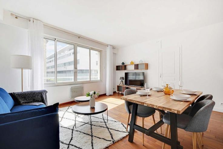 Elegantly designed living room with modern furnishings in an apartment at Building Rue Olivier de Serres - belvilla-ag-dancenter-as - 1446155 in 15th arrondissement, Paris Elegantly designed living room with modern furnishings in an apartment at Building Rue Olivier de Serres - belvilla-ag-dancenter-as - 1446155 in 15th arrondissement, Paris