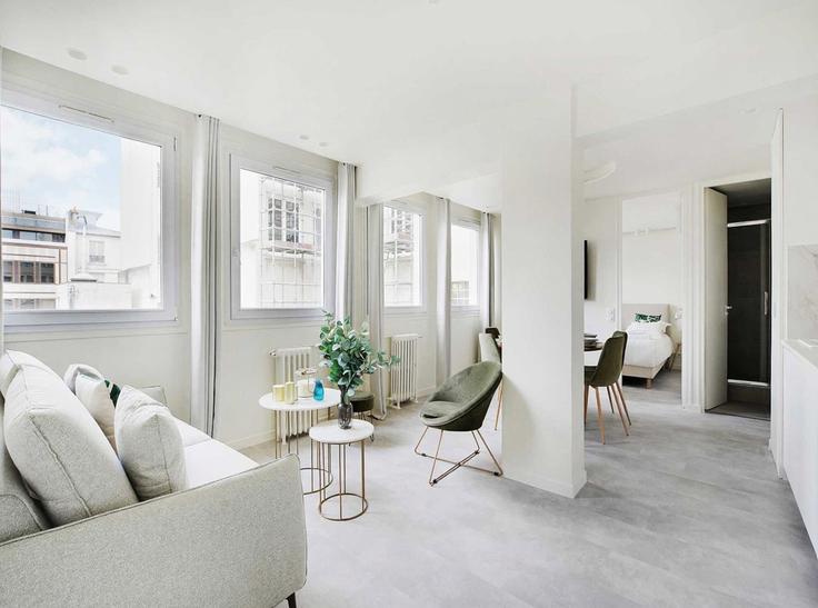 Elegantly designed living room with modern furnishings in an apartment at Building Rue de Ponthieu - belvilla-ag-dancenter-as - 1446563 in 8th arrondissement, Paris