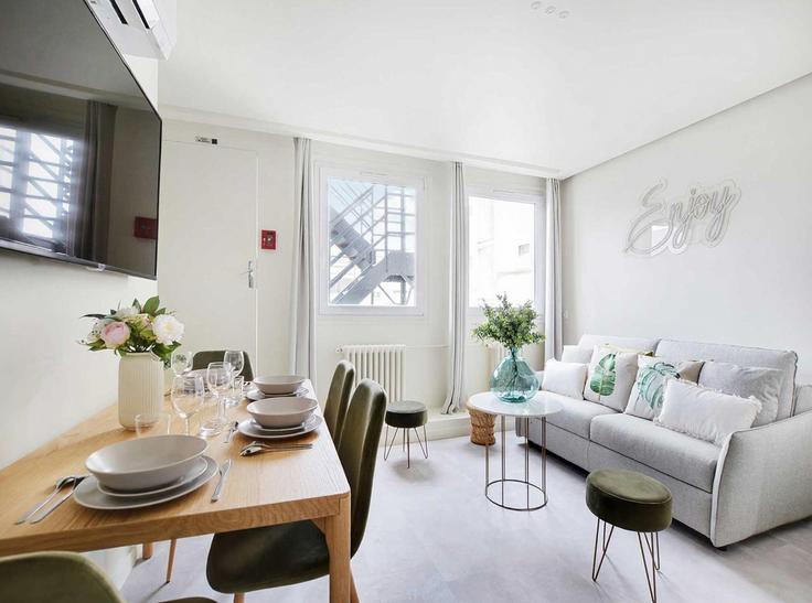Elegantly designed living room with modern furnishings in an apartment at Building Rue de Ponthieu - belvilla-ag-dancenter-as - 1426080 in 8th arrondissement, Paris Elegantly designed living room with modern furnishings in an apartment at Building Rue de Ponthieu - belvilla-ag-dancenter-as - 1426080 in 8th arrondissement, Paris