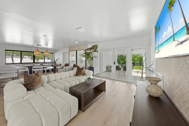 Elegantly designed living room with modern furnishings in an apartment at Building Northeast 113th Street - benichaybrothersllc - 1540474 in Miami, Miami