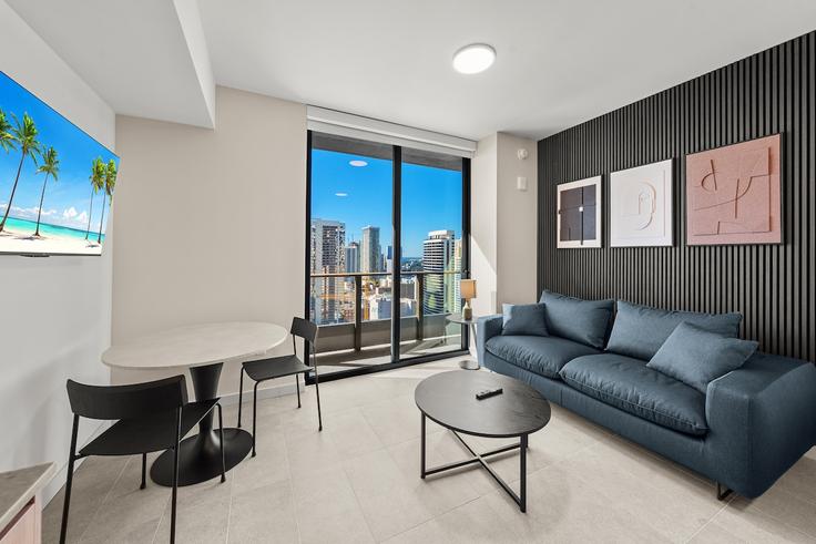 Elegante sala de estar con mobiliario moderno en un apartamento en Building Northeast 5th Street - benichaybrothersllc - 1540454 en Miami, Miami Elegante sala de estar con mobiliario moderno en un apartamento en Building Northeast 5th Street - benichaybrothersllc - 1540454 en Miami, Miami