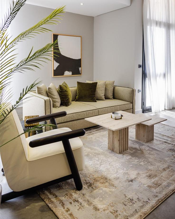Elegantly designed living room with modern furnishings in an apartment at Building 2CFG+335 - bird-nest - 1369391 in New Cairo 1, Cairo