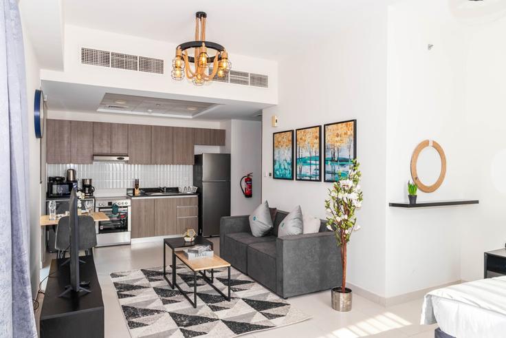 Elegantly designed living room with modern furnishings in an apartment at Building Al Raha St - bloomfields-holiday-home - 1474810 in Al Rahah, Abu Dhabi