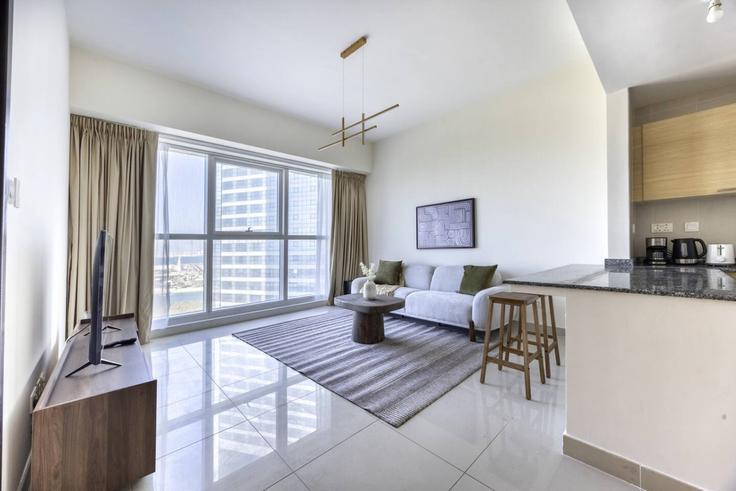 Salle de séjour élégante avec mobilier moderne dans un appartement à Building Matar Bin Thani Al Rumaithi Street - bloomfields-holiday-home - 1475069 à Al Reem Island, Abu Dhabi Salle de séjour élégante avec mobilier moderne dans un appartement à Building Matar Bin Thani Al Rumaithi Street - bloomfields-holiday-home - 1475069 à Al Reem Island, Abu Dhabi