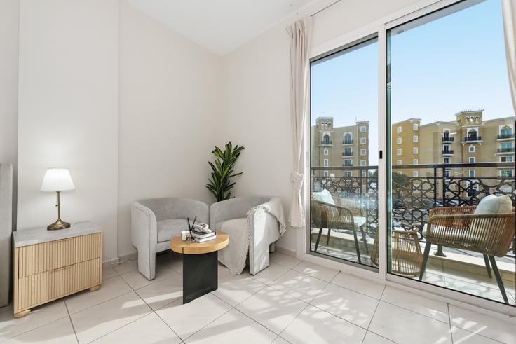 Elegantly designed living room with modern furnishings in an apartment at Building Tariaq Bedon Esm - bloomfields-holiday-home - 1512420 in Warsan First, Dubai