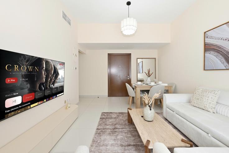 Salle de séjour élégante avec mobilier moderne dans un appartement à Building Tariaq Bedon Esm - bloomfields-holiday-home - 1628636 à Al Barsha South Fifth, Dubai Salle de séjour élégante avec mobilier moderne dans un appartement à Building Tariaq Bedon Esm - bloomfields-holiday-home - 1628636 à Al Barsha South Fifth, Dubai