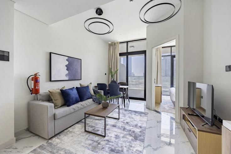 Elegant gestaltetes Wohnzimmer mit moderner Einrichtung in einer Wohnung im Building Ar Reem Street - bloomfields-holiday-home - 1475036 in Al Maryah Island, Abu Dhabi Elegant gestaltetes Wohnzimmer mit moderner Einrichtung in einer Wohnung im Building Ar Reem Street - bloomfields-holiday-home - 1475036 in Al Maryah Island, Abu Dhabi