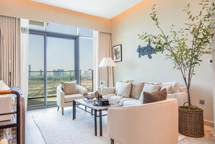 Elegantly designed living room with modern furnishings in an apartment at Building Tariaq Bedon Esm - bloomfields-holiday-home - 1474980 in Al Jaddaf, Dubai