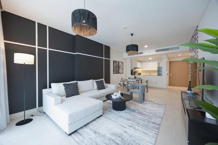 Elegant gestaltetes Wohnzimmer mit moderner Einrichtung in einer Wohnung im Building Matar Bin Thani Al Rumaithi Street - bloomfields-holiday-home - 1475218 in Al Reem Island, Abu Dhabi Elegant gestaltetes Wohnzimmer mit moderner Einrichtung in einer Wohnung im Building Matar Bin Thani Al Rumaithi Street - bloomfields-holiday-home - 1475218 in Al Reem Island, Abu Dhabi