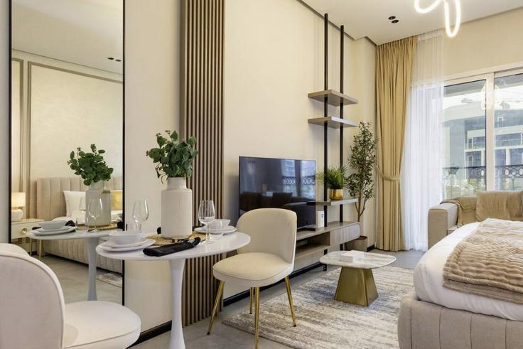 Salle de séjour élégante avec mobilier moderne dans un appartement à Building Tariaq Bedon Esm - bloomfields-holiday-home - 1475018 à Al Barsha South Third, Dubai