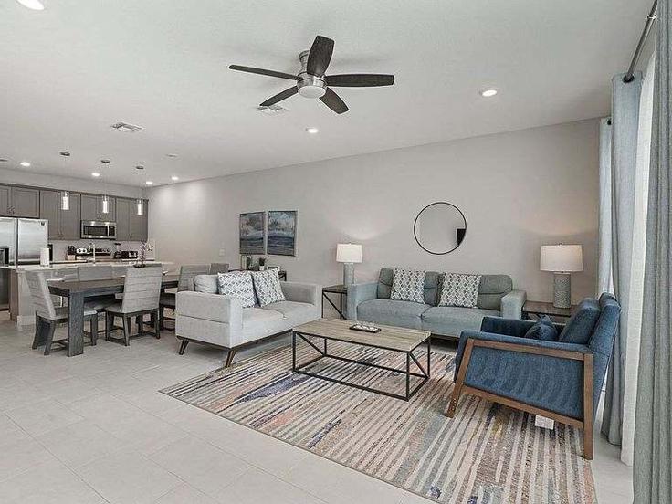 Elegant gestaltetes Wohnzimmer mit moderner Einrichtung in einer Wohnung im Building Draw Street - bluegems - 1295162 - MCO in Four Corners, Four Corners