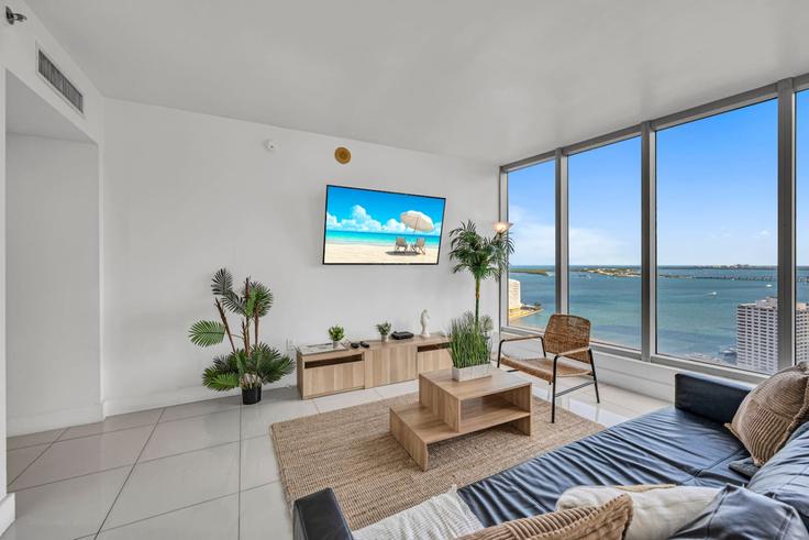 Elegante sala de estar con mobiliario moderno en un apartamento en Building Brickell Avenue - blues-vacation-rentals-llc - 1520381 en Miami, Miami Elegante sala de estar con mobiliario moderno en un apartamento en Building Brickell Avenue - blues-vacation-rentals-llc - 1520381 en Miami, Miami