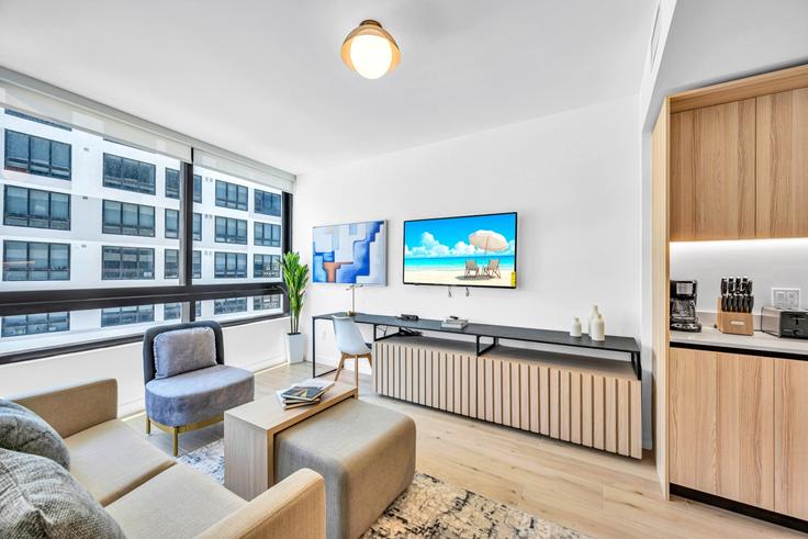 Elegantly designed living room with modern furnishings in an apartment at Building North Miami Avenue - blues-vacation-rentals-llc - 1520399 in Miami, Miami