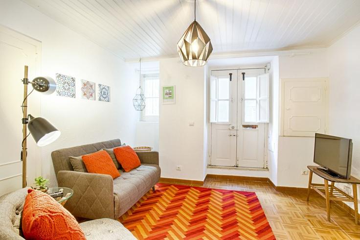 Elegantly designed living room with modern furnishings in an apartment at Building Rua João do Outeiro - bmyguest - 1468363 in Santa Maria Maior, Lisbon