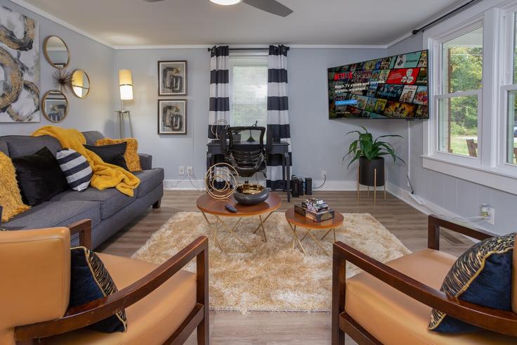 Elegantly designed living room with modern furnishings in an apartment at Building West Mckinley Street - bnb-made-simple - 1609611 in Mebane, Mebane