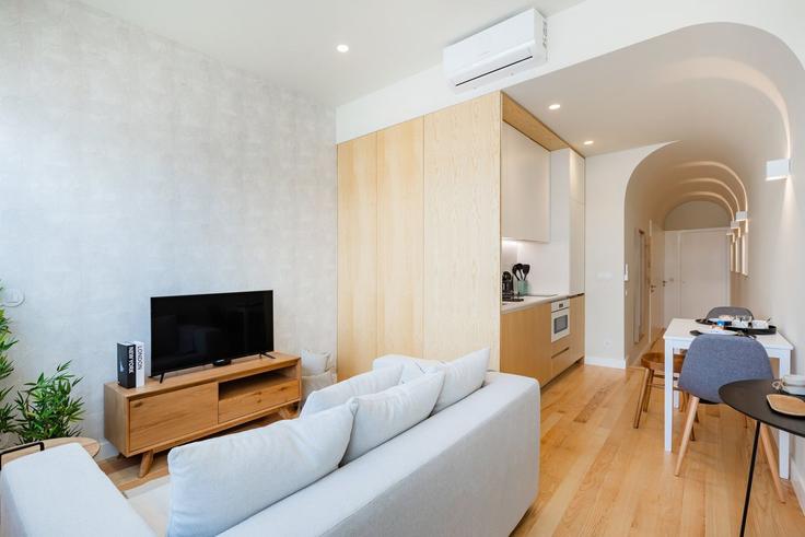 Building Rua de Agramonte - bnbird-homes-lda - 1556060 adresindeki bir dairede modern mobilyalarla zarif bir şekilde tasarlanmış oturma odası Lordelo do Ouro e Massarelos, Porto Building Rua de Agramonte - bnbird-homes-lda - 1556060 adresindeki bir dairede modern mobilyalarla zarif bir şekilde tasarlanmış oturma odası Lordelo do Ouro e Massarelos, Porto