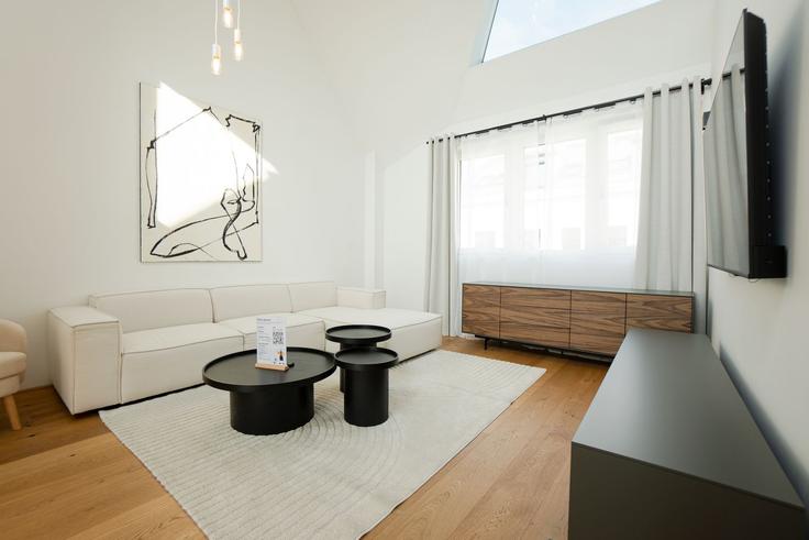 Vienna ViennaのBuilding Fockygasse 6 - bosu-gmbh - 1500389のアパートメントにある、モダンな家具を備えたエレガントなデザインのリビングルーム Vienna ViennaのBuilding Fockygasse 6 - bosu-gmbh - 1500389のアパートメントにある、モダンな家具を備えたエレガントなデザインのリビングルーム
