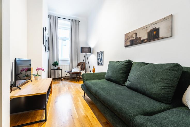 Vienna ViennaのBuilding Fockygasse 6 - bosu-gmbh - 1500244のアパートメントにある、モダンな家具を備えたエレガントなデザインのリビングルーム Vienna ViennaのBuilding Fockygasse 6 - bosu-gmbh - 1500244のアパートメントにある、モダンな家具を備えたエレガントなデザインのリビングルーム