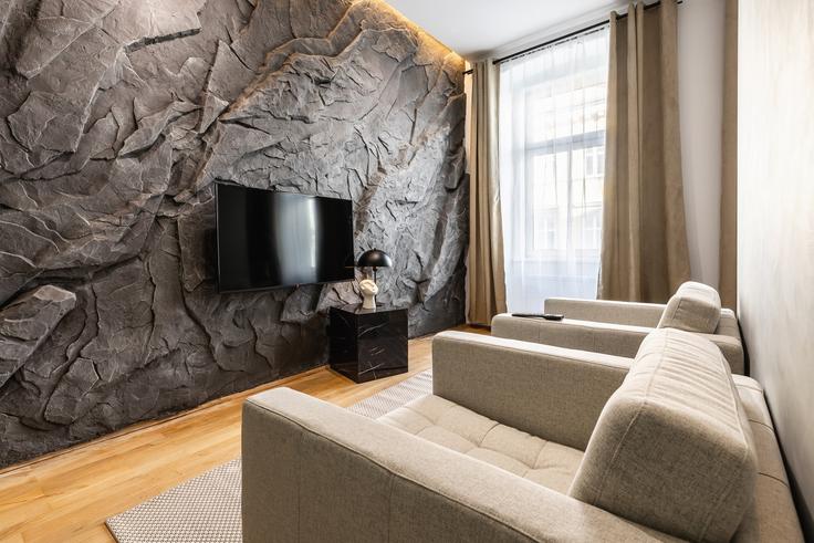 Vienna ViennaのBuilding Fockygasse 6 - bosu-gmbh - 1500257のアパートメントにある、モダンな家具を備えたエレガントなデザインのリビングルーム Vienna ViennaのBuilding Fockygasse 6 - bosu-gmbh - 1500257のアパートメントにある、モダンな家具を備えたエレガントなデザインのリビングルーム