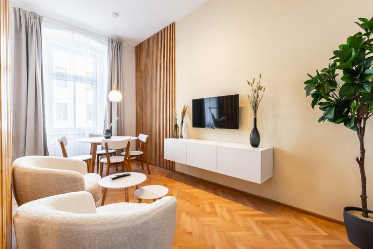 Vienna ViennaのBuilding Fockygasse - bosu-gmbh - 1500259のアパートメントにある、モダンな家具を備えたエレガントなデザインのリビングルーム Vienna ViennaのBuilding Fockygasse - bosu-gmbh - 1500259のアパートメントにある、モダンな家具を備えたエレガントなデザインのリビングルーム