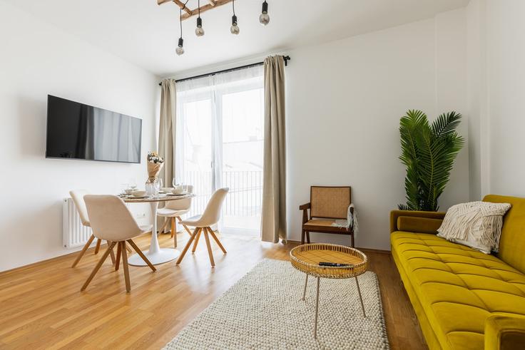 Vienna ViennaのBuilding Kolonitzgasse - bosu-gmbh - 1500284のアパートメントにある、モダンな家具を備えたエレガントなデザインのリビングルーム Vienna ViennaのBuilding Kolonitzgasse - bosu-gmbh - 1500284のアパートメントにある、モダンな家具を備えたエレガントなデザインのリビングルーム