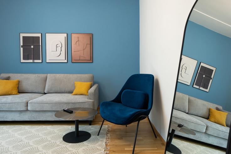 Sala de estar elegantemente projetada com móveis modernos em um apartamento no Building Kolonitzgasse 2 - bosu-gmbh - 1500287 em Vienna, Vienna Sala de estar elegantemente projetada com móveis modernos em um apartamento no Building Kolonitzgasse 2 - bosu-gmbh - 1500287 em Vienna, Vienna